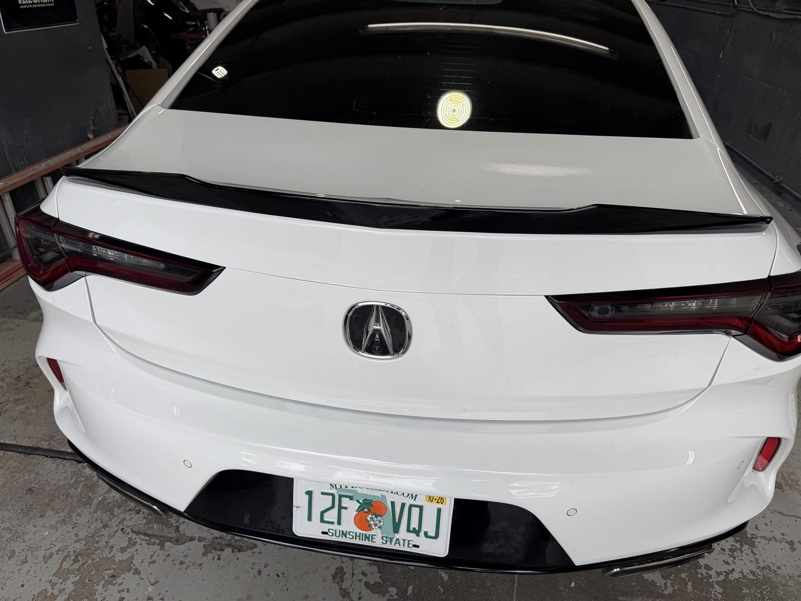 Acura TLX rear-end rebuild at Automotive World Collision Center — before and after