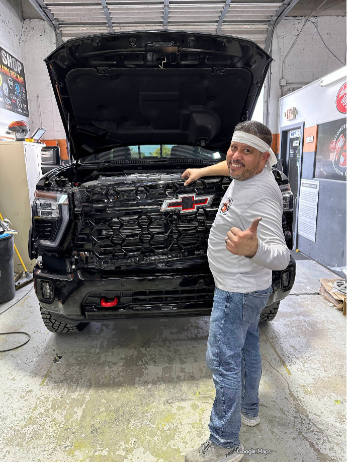 Inside Automotive World Collision Center — the team at work in the Miami shop
